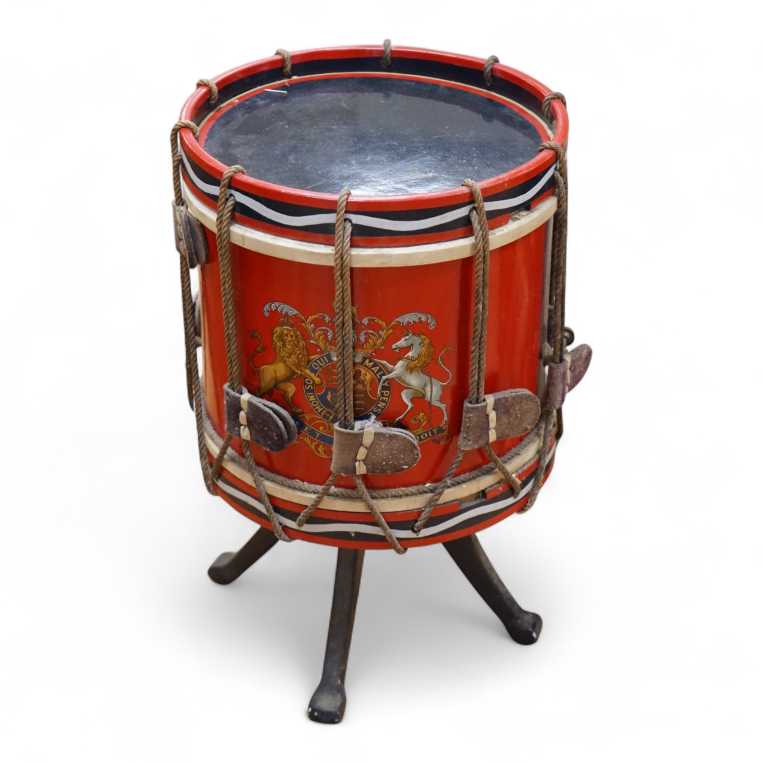 A red painted Regimental drum shaped table, 62cm high